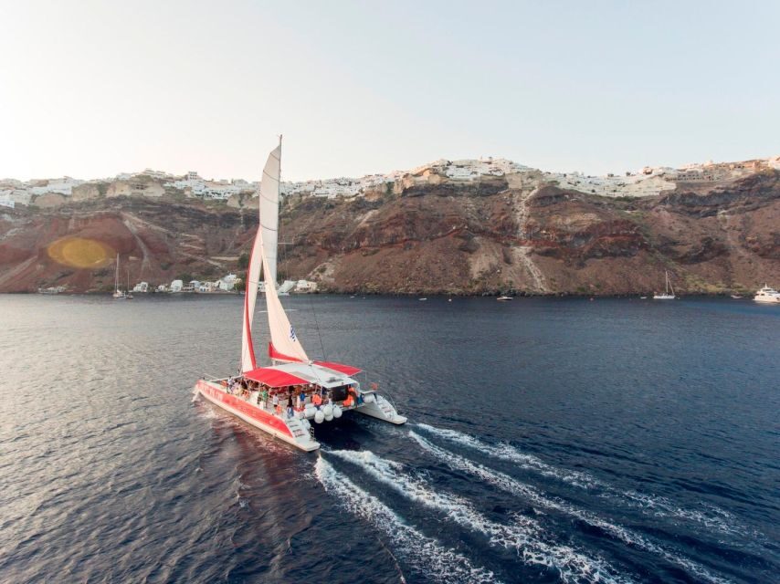 Santorini: Cruise Catamaran with BBQ & Drinks Day or Sunset - Oia from the water: the sunset option that makes sense