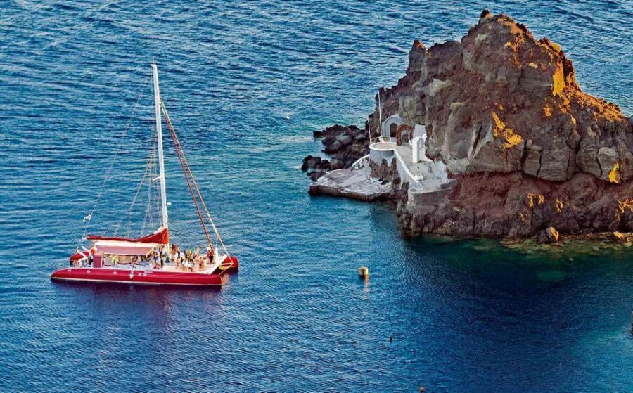 Santorini: Cruise Catamaran with BBQ & Drinks Day or Sunset - The caldera route: why sailing here feels different