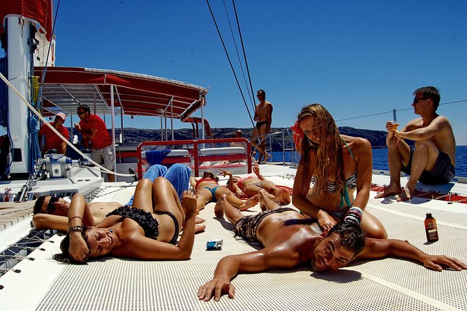 Santorini Cruise on Catamaran with BBQ & Open Bar - The volcano and hot springs: black rock and warmer water
