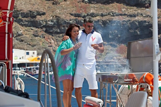 Santorini Cruise on Catamaran with BBQ & Open Bar - Timing, weather, and the chance of a sunset