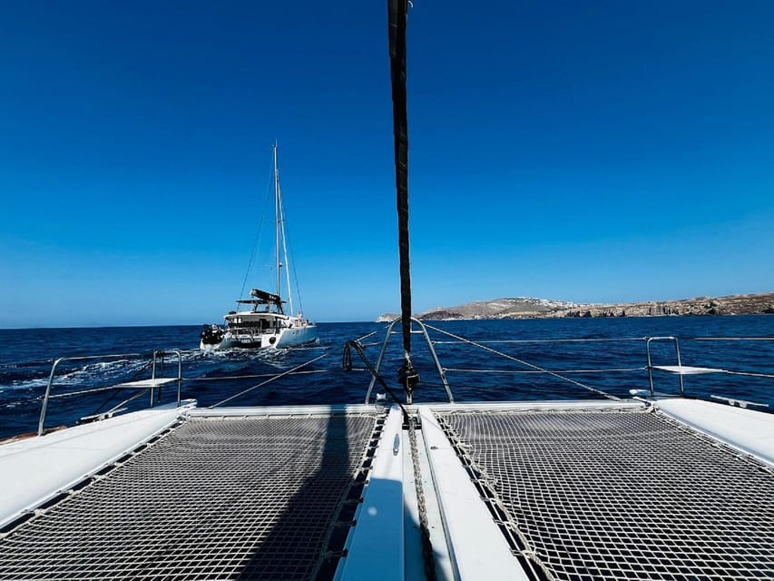 Santorini:Cruises with Catamaran around the Volcanic Island. - Swimming at the volcanic thermal springs