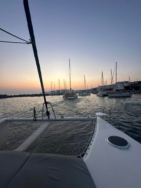 Santorini:Cruises with Catamaran around the Volcanic Island. - Daylight sailing or the sunset finish