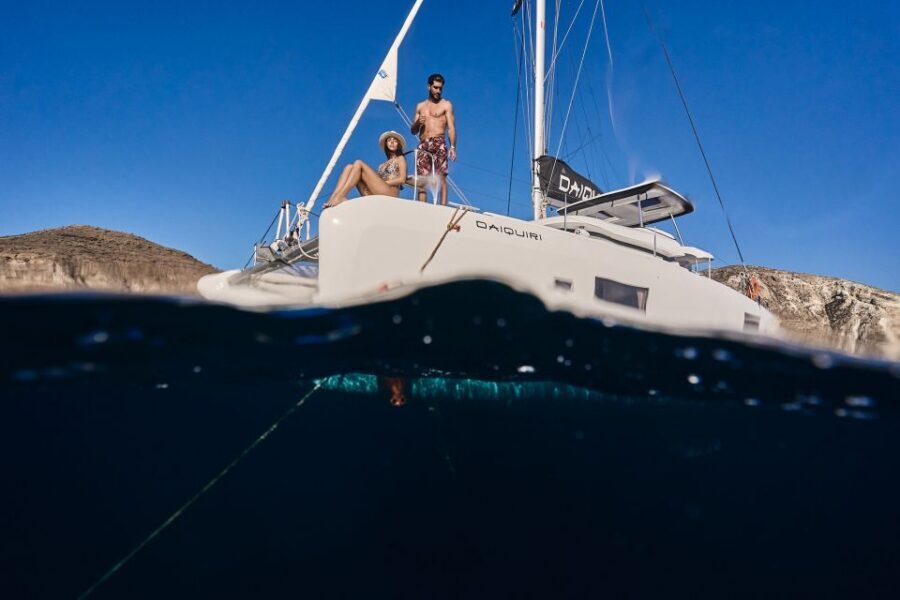 Santorini: Day Luxury Catamaran Cruise with Meal & Drinks - Old Harbor of Fira and Armeni Bay: Photo Time Without the Crowds