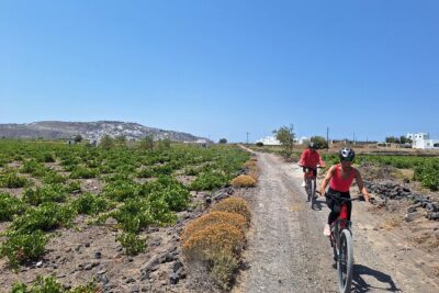 Santorini: E-Bike Sunset Tour Experience - Starting with Santorini’s tomato story