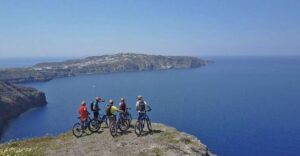 Santorini: Electric Mountain Bike Adventure - Warm-up at Perivolos: black sand, first views, easy start
