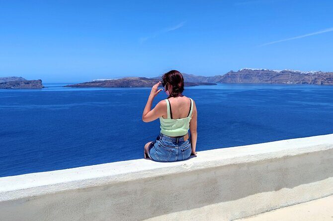 Santorini Essentials Half Day Private Sightseeing Tour - Oia village: shops, castle ruins, marble alleys, and big views