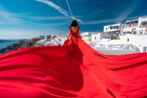 Santorini flying dress photo - Dress rental and changing logistics: what’s included and what costs extra