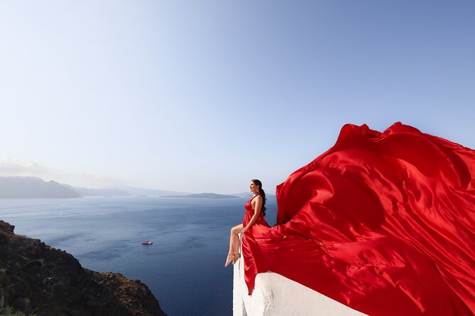 Santorini Flying Dress Photography - Danai and her assistants make the posing easier