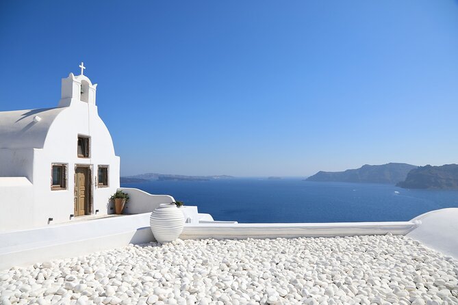 Santorini Full-Day Tour from Heraklion Crete - Red Beach shows Santorini’s volcanic side