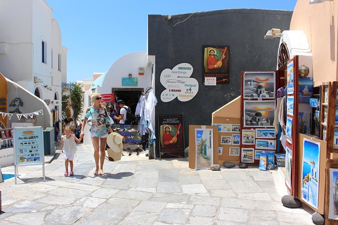 Santorini Full Day Tour - Boarding the King Thiras at Athinios