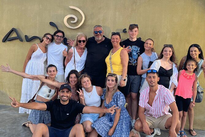 Santorini: Full Island Tour & Sunset with Local Guide & Pick-up - Red Beach: Red Cliffs, Blue Water, and a Volcanic Lesson
