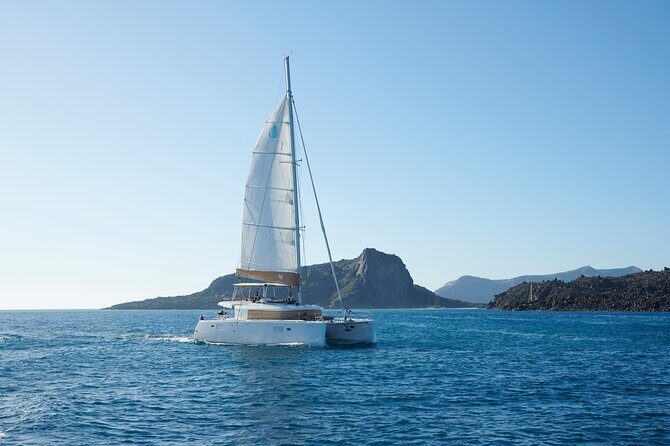 Santorini Gold Catamaran Cruise with BBQ, Drinks and Hotel Pickup - Snorkeling gear is included, but your comfort matters more