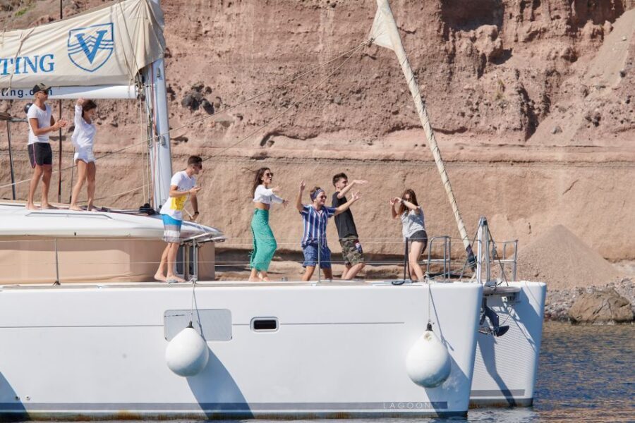 Santorini Gold Catamaran Cruise with Snorkel, BBQ & Open Bar - Volcano history on board: learning while you cruise