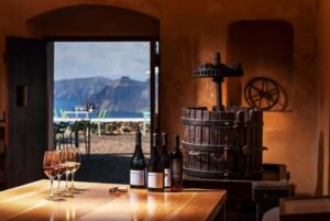 Santorini: Guided Wine Tour with Pickup and Snacks - Shared group or private tour: what changes the feel