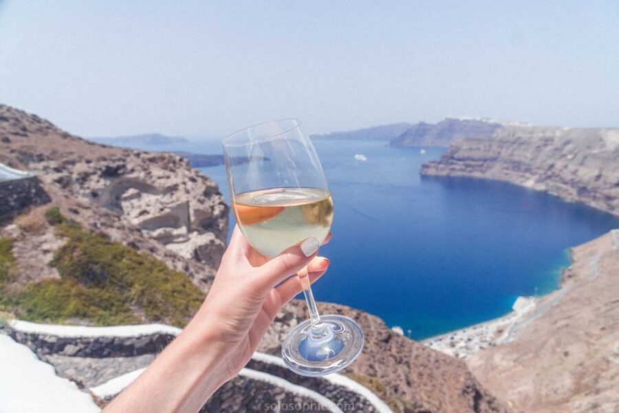 Santorini: Guided Wine Tour with Pickup and Snacks - Venetsanos Winery above Athinios: caldera views and the finish