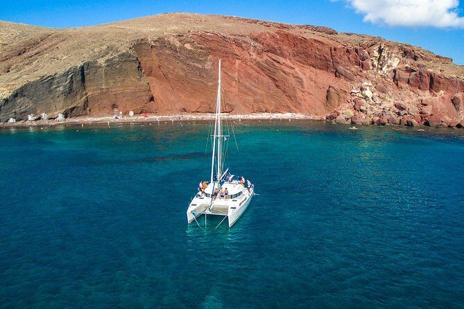 Santorini Half Day Catamaran Private Cruise incl. Meal, Drinks & Free Transport - Price and what you truly receive for $506.85 per person
