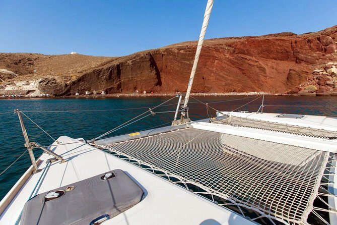 Santorini Half Day Catamaran Private Cruise incl. Meal, Drinks & Free Transport - Aspronisi (Strogili): the small uninhabited island you can feel in photos