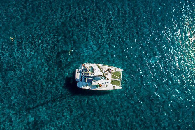 Santorini Half Day Catamaran Private Cruise incl. Meal, Drinks & Free Transport - Pickup timing in real life: morning vs afternoon starts