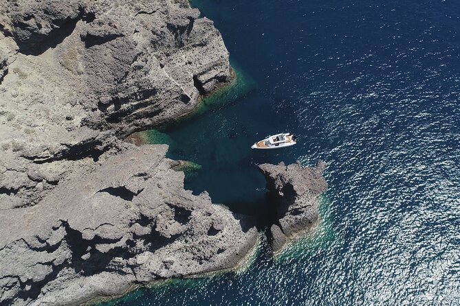 Santorini Half Day MotorCruiser Private Cruise incl. Meal,Drinks &Free Transport - Starting at Vlihada Port in southern Santorini