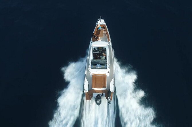 Santorini Half Day MotorCruiser Private Cruise incl. Meal,Drinks &Free Transport - The lighthouse and Aspronisi’s volcanic layers
