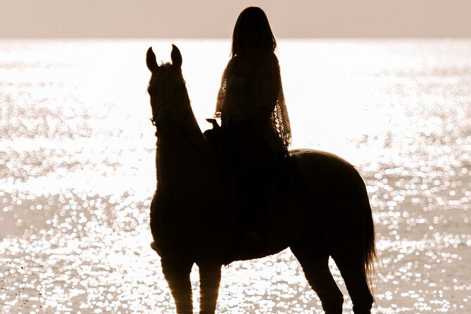 Santorini: Horse Riding to the Black Sandy Beach (Eros beach) - Eros Beach Arrival: Black shore, rock cliffs, and real photo drama