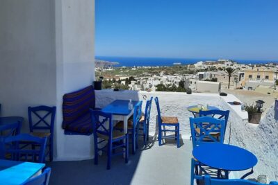 Santorini like a local: Discover local flavors by exploring the island! - Venetsanos Winery pairs wine with a caldera view