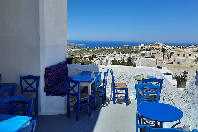 Santorini like a local: Discover local flavors by exploring the island! - Venetsanos Winery pairs wine with a caldera view