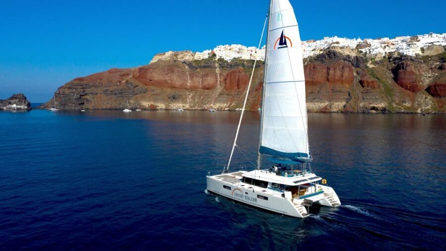 Santorini: Luxurious Catamaran Cruise with Meal & Open Bar - Toilets, Seawater Wash-Off, Towels, and the Stuff That Saves Your Day