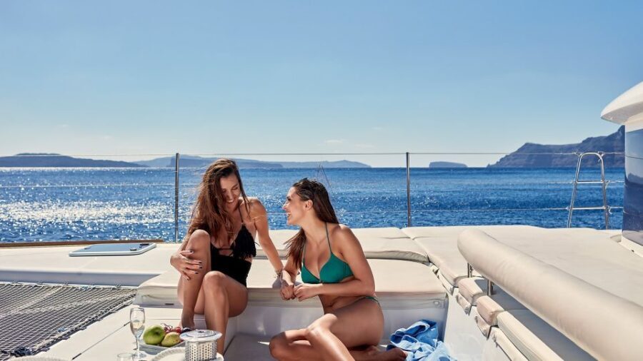 Santorini: Luxurious Catamaran Cruise with Meal & Open Bar - Getting From Thera to Oia: The Van Ride and the Caldera Reveal