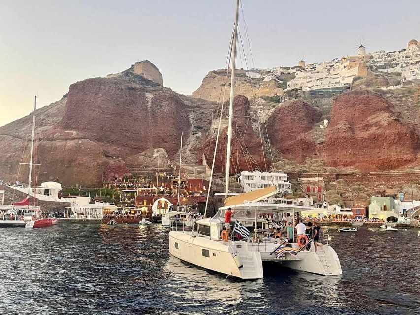 Santorini: Luxury Caldera Cruise with Full Greek Meal - Red Beach water time: swimming and snorkelling