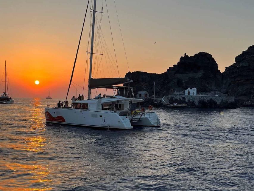 Santorini: Luxury Caldera Cruise with Full Greek Meal - Dinner onboard: a real Greek meal, served family-style