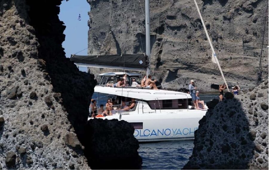 Santorini: Luxury Caldera Cruise With Meal & Drinks - Lunch and drinks: Greek mezedes and BBQ with dessert included