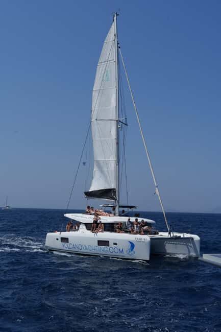 Santorini: Luxury Caldera Cruise With Meal & Drinks - Getting to the boat: pickup, small group energy, and what’s actually included