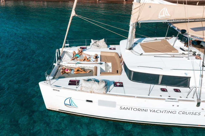 Santorini: Luxury Catamaran Cruise with Lunch, BBQ & Drinks - Red Beach, White Beach, and the Akrotiri Lighthouse: the photo stops with a purpose