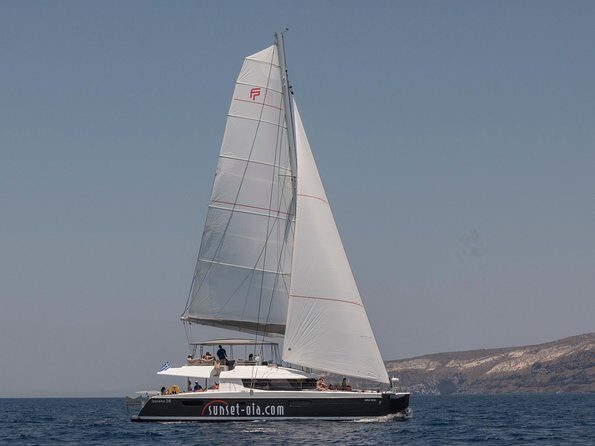 Santorini Luxury Catamaran Day Cruise with BBQ,drinks,transfer - Hotel transfers and the small-group feel that actually changes the day