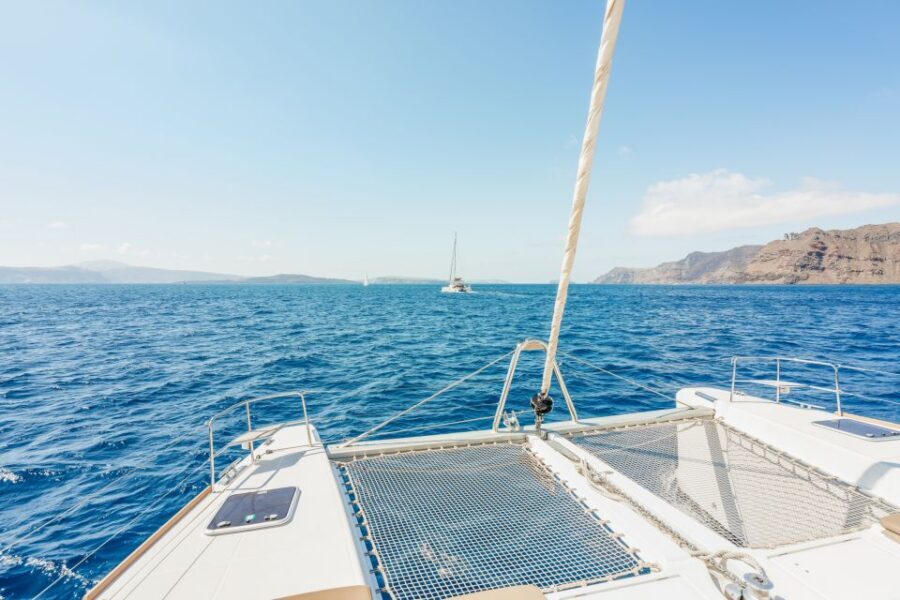 Santorini: Luxury Catamaran Day Trip with Meal and Open Bar - Snorkel and Swim Stops: What You’ll Do in the Water