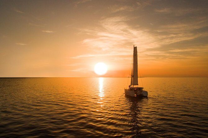 Santorini Luxury Catamaran Sunset Cruise with BBQ, Drink and Transfer - White Beach and the BBQ onboard: the longest stop for food and sea time