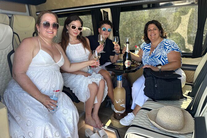 Santorini Luxury Private Island Tours by Golden Memories Tours - Perissa Black Sand Beach: The Classic Santorini Beach Day