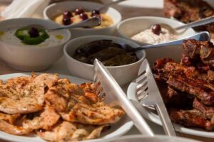Santorini Luxury Sailing Catamaran Cruise with BBQ, Drinks and Transfer - Ancient lighthouse from the sea: the quick scenic moment that adds meaning