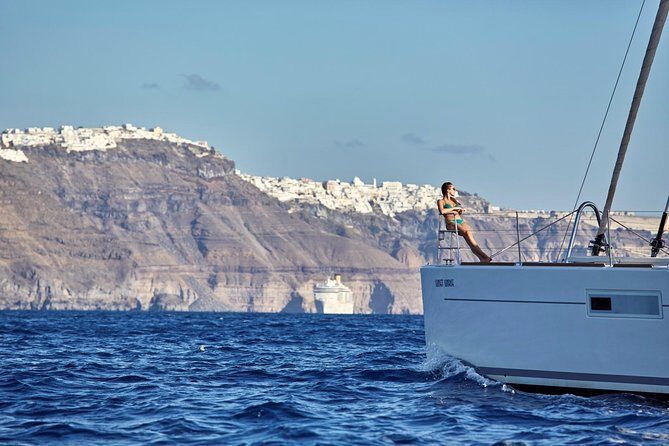 Santorini Luxury Sailing Catamaran Cruise with BBQ, Drinks and Transfer - Red Beach stop: short swim window, stunning color