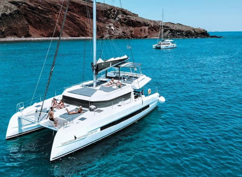 Santorini: Majestic Catamaran Cruise with Meal and Drinks - Your 5-hour Santorini catamaran comfort bubble