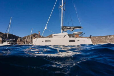 Santorini Oia: Caldera Day Cruise with Snacks & Drinks - Thirassia: your first swim and local snacks