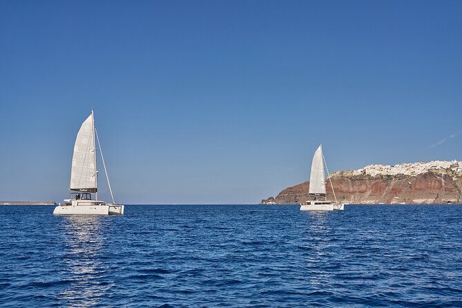 Santorini Oia: Caldera Luxury Day Cruise with BBQ & Drinks - Stop 1: Thirassia Island swim in a calm bay