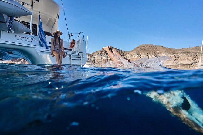 Santorini Oia: Caldera Private Day Cruise with BBQ & Drinks - Stop 2: Palea Kameni Volcano Rocks and Sulfur-Springs Water