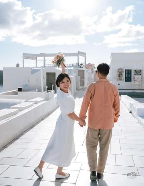 Santorini: Oia Private Couple Photoshoot with 35 Photos - Blue domes and priority entrance: skipping the time-sink