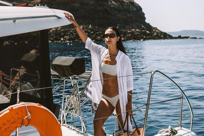 Santorini Oia: Private Sunset Catamaran Cruise with BBQ & Drinks - Nea Kameni: salt-buoyancy, lava colors, and more time in the water