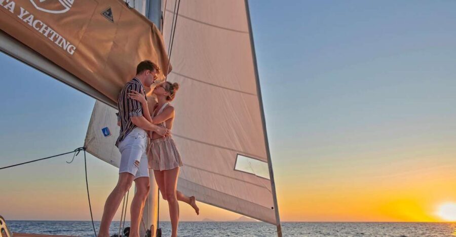Santorini: Platinum Catamaran Cruise w/ BBQ Meal & Open Bar - Red Beach and White Beach: quick stops with big volcanic color