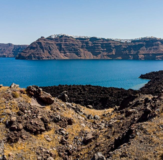 Santorini Port: 3 Hour Cruise to Volcano and Hot Springs - From Fira Old Port to the open caldera: how this cruise starts