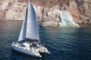 Santorini: Premium Small-Group Catamaran Cruise with Food/Drinks - Stop 1: Santorini Start Point and a Quick Break