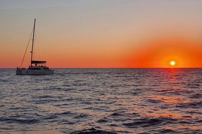 Santorini Private Catamaran Cruise with BBQ, Open Bar & Transfers - Mesa Pigadia bay: a swim break without a beach drop-off